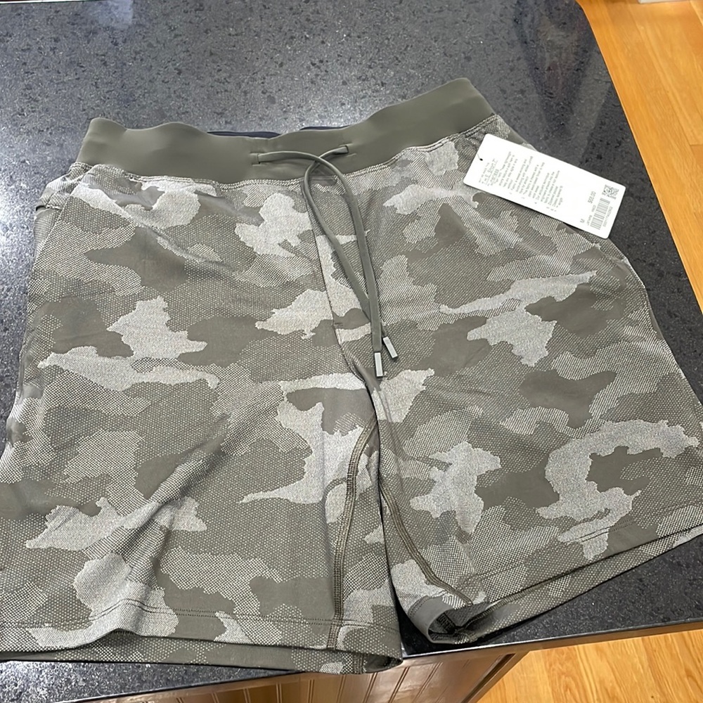 LULULEMON brand new with tags. T.H.E. Short 7 inch Linerless. Size medium. Camo